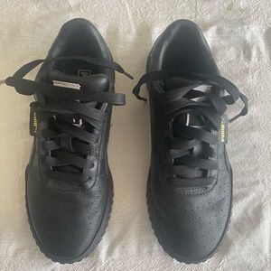 Womens black Puma sneakers. Size 8. Worn once.